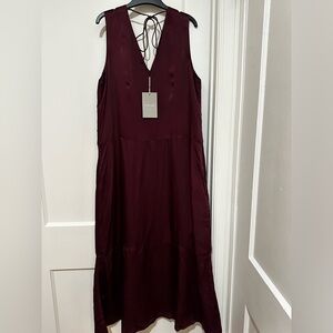 Long, NWT, deep wine-colored dress. I’m 5-4 and it hits above my ankles